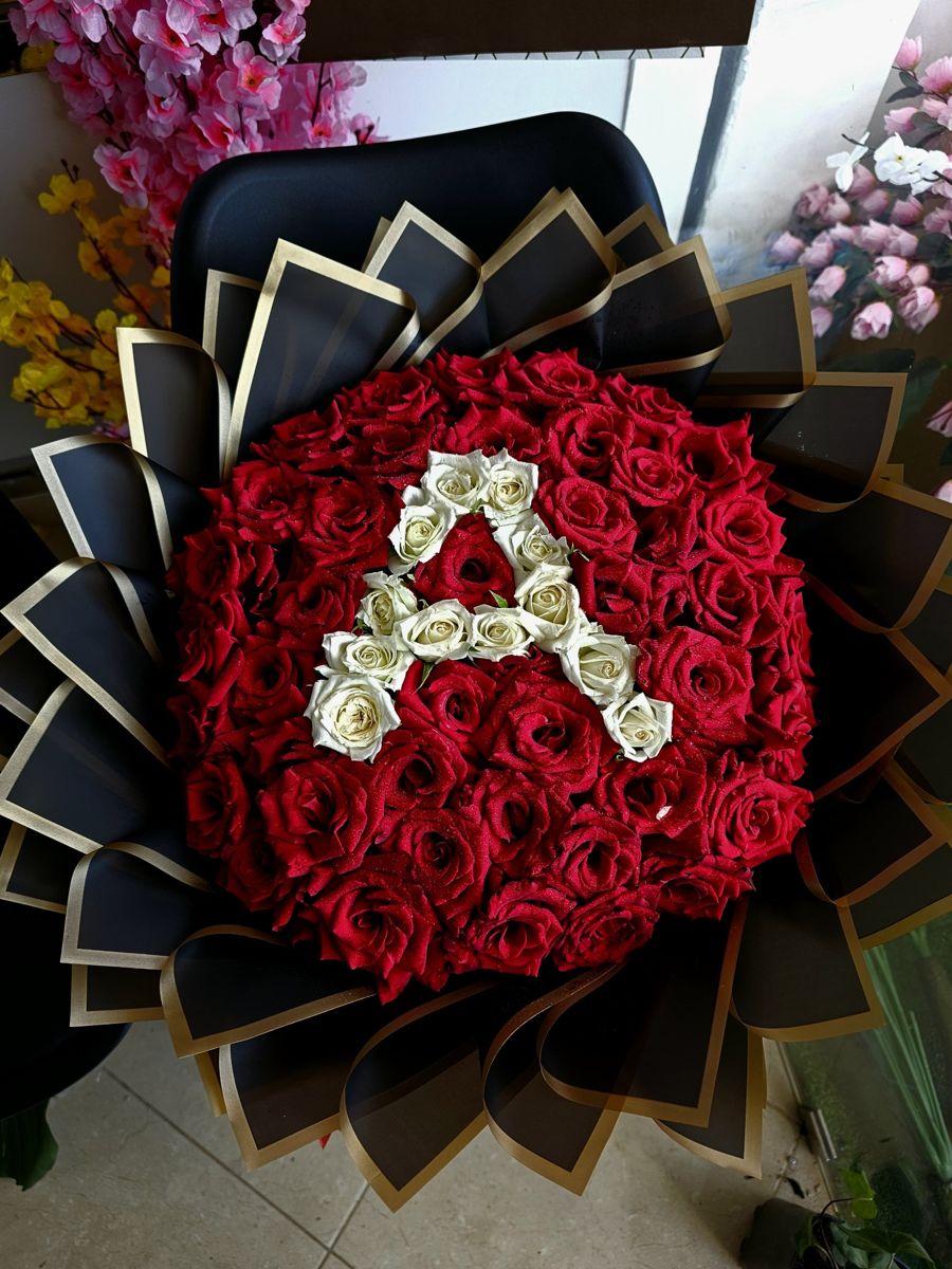 Initiale en Roses